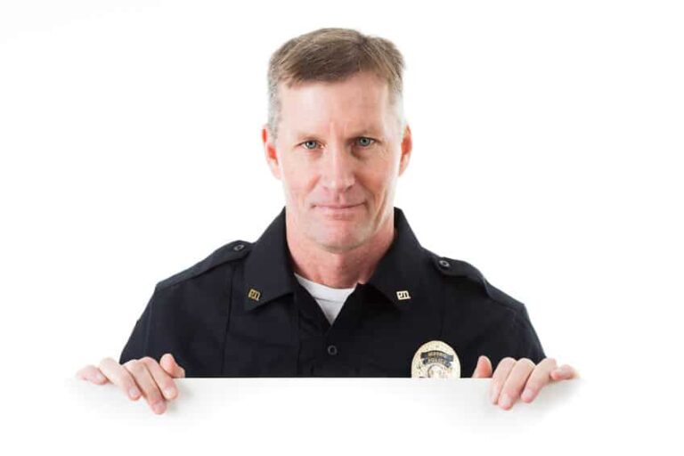 Clean shaven police officer in a white foreground and background