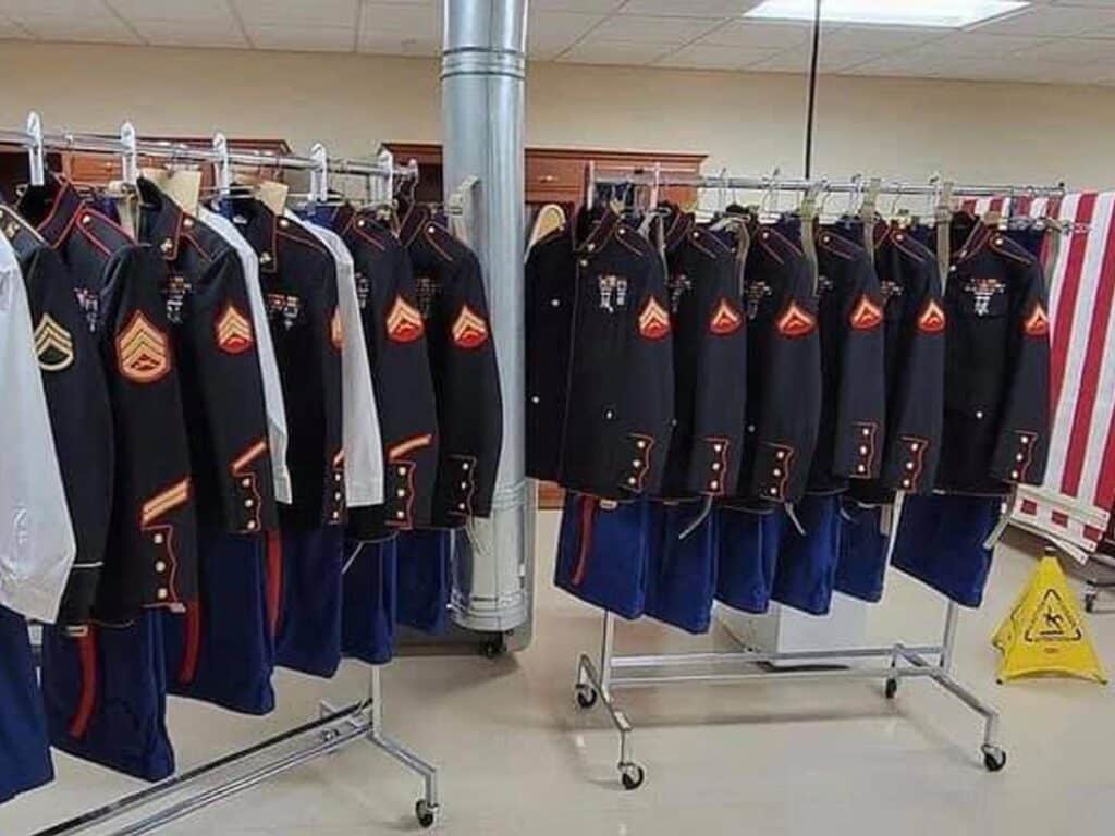 US Marine Corps uniforms hanging in a clothesrack